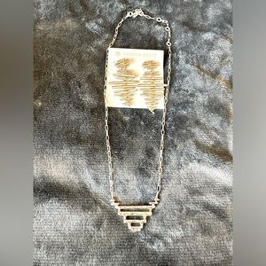 Silver Kendra Scott earrings and necklace set.  Madelyn statement earrings.